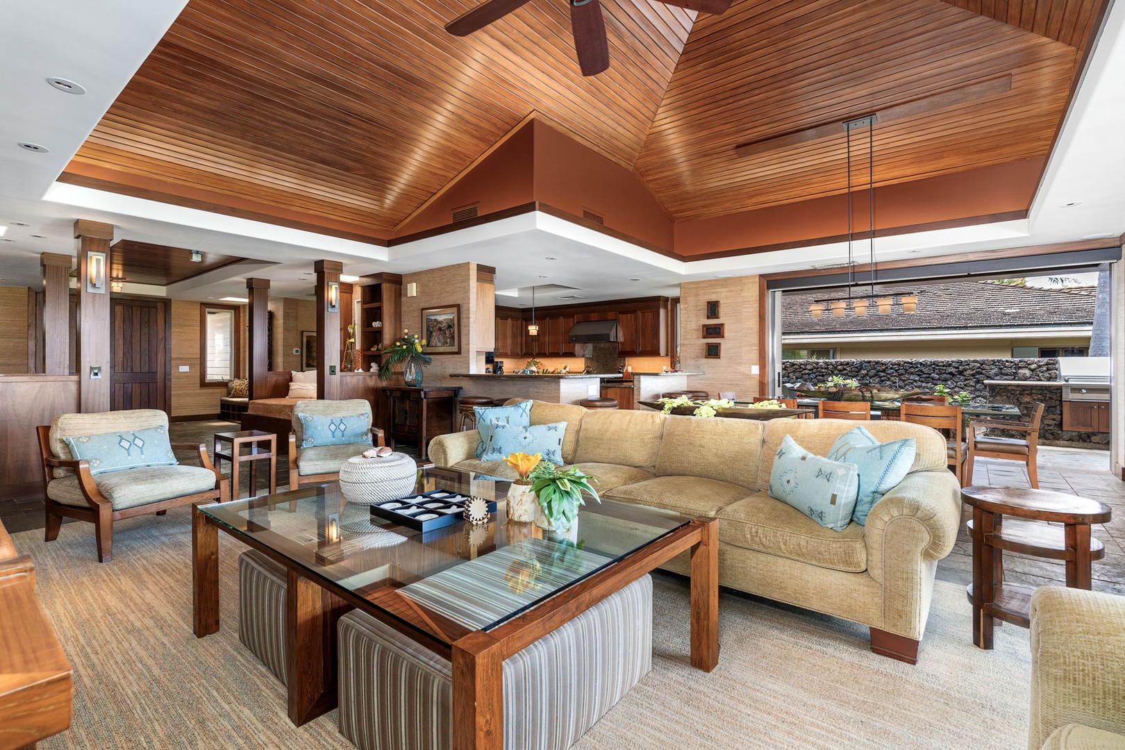 Kailua Kona Vacation Rentals, 3BD Pakui Street Estate (149) at Hualalai Resort - From the armchairs, the living room opens straight through to the kitchen beyond.
