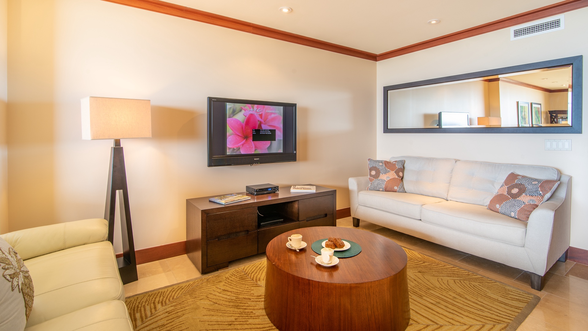 Kapolei Vacation Rentals, Ko Olina Beach Villas O1604 - A TV and sofa bed for your convenience in the living room.