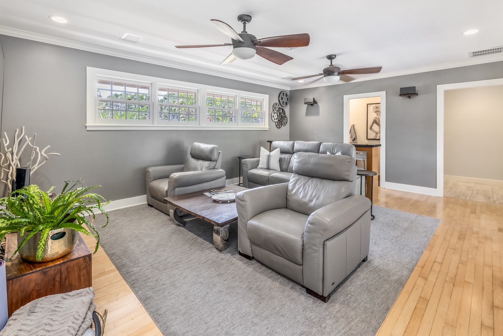 Honolulu Vacation Rentals, Moana Lani - Main House - Sink into the reclining seats in the media room once the day outside is done.