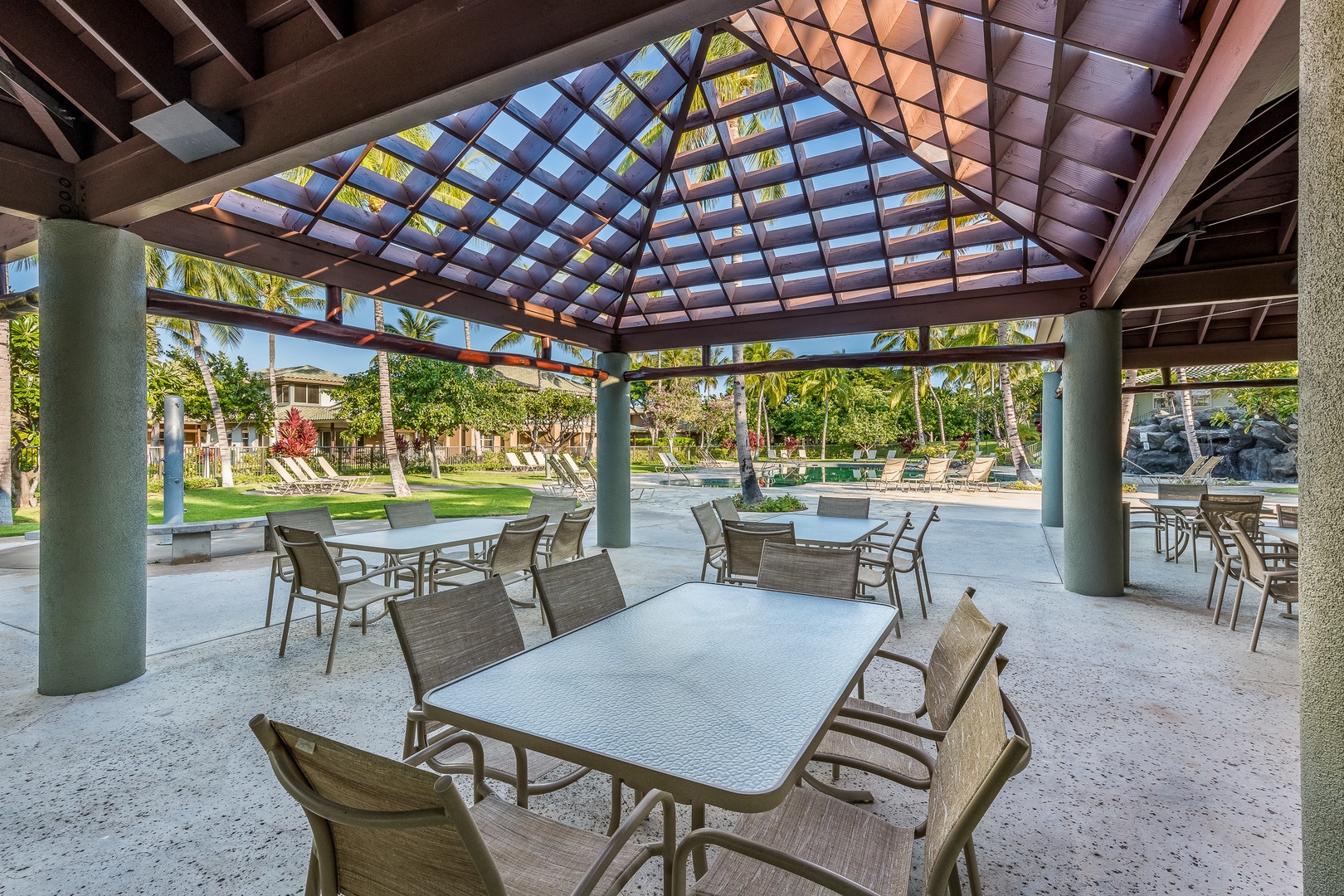 Kamuela Vacation Rentals, Mauna Lani Fairways #204 - Gather with friends and family under the shaded pavilion, featuring a grilling station and tropical garden surroundings.