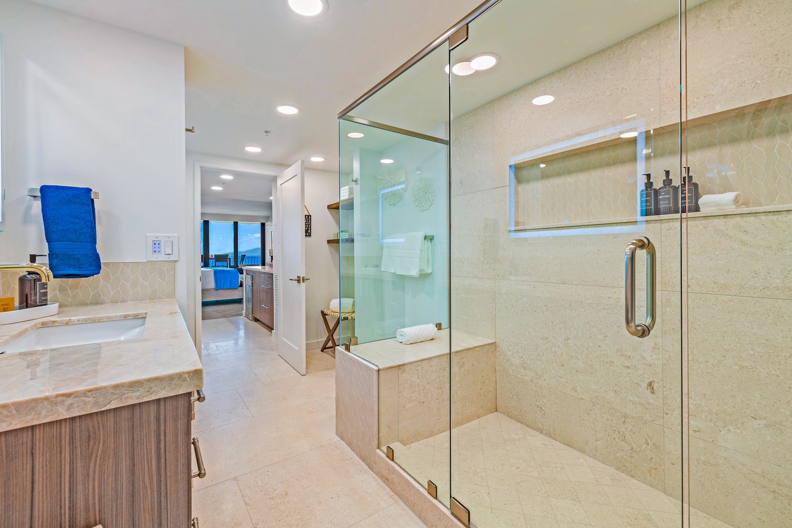 Lahaina Vacation Rentals, Kaanapali Shores 702 - The large walk-in shower in the primary bathroom offers a relaxing and luxurious experience with modern fixtures.