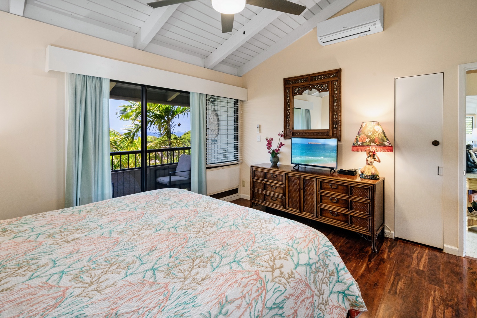Kihei Vacation Rentals, Wailea Ekolu 204 - Curtains pulled back, and the primary suite opens straight onto its own private balcony.