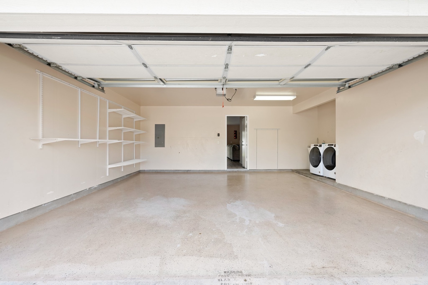 Kapolei Vacation Rentals, Kilipue Retreat - Expansive garage with room for vehicles, beach gear, and bikes.