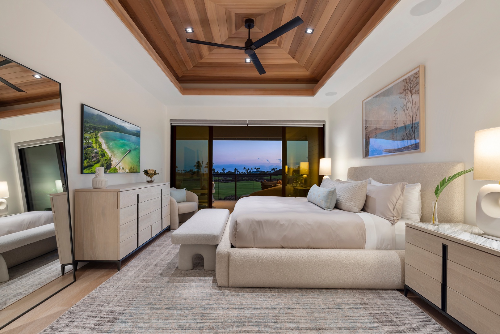 Kamuela Vacation Rentals, 6BD Mauna Lani Lux Golf Estate (6) at One Ocean - Room to spread out in the Upstairs Primary Suite (Bedroom #1), a sitting area and the fairway beyond the doors.