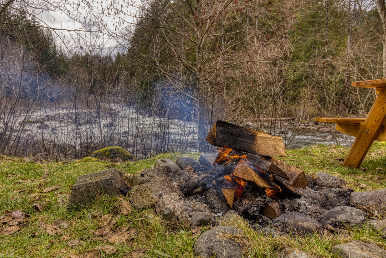 Rhododendron Vacation Rentals, Riverbend Cabin #2 - Fire pit makes for a warm and cozy evening by the river