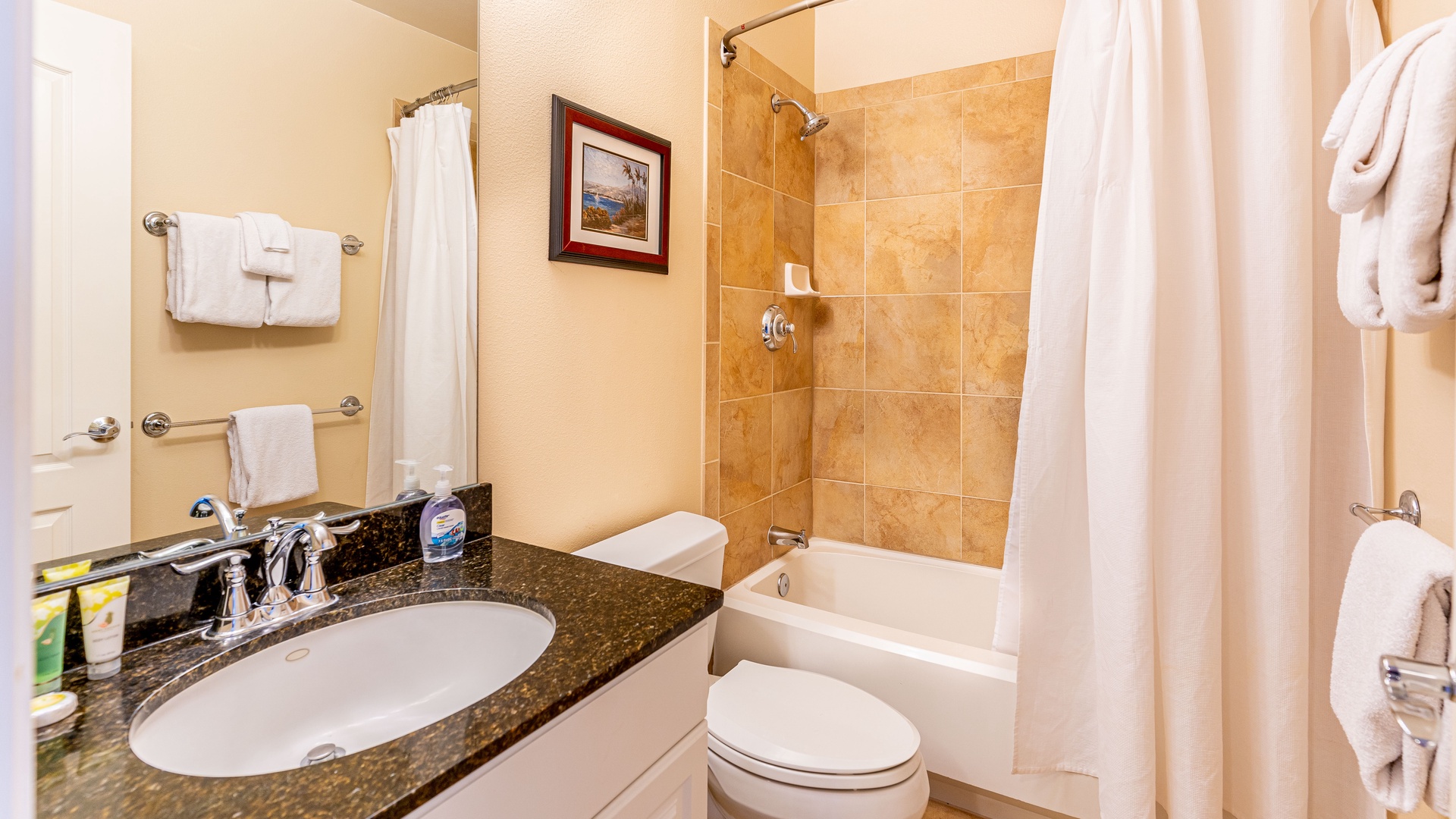 Kapolei Vacation Rentals, Ko Olina Kai 1033C - The second guest bathroom featuring a shower and tub combo.