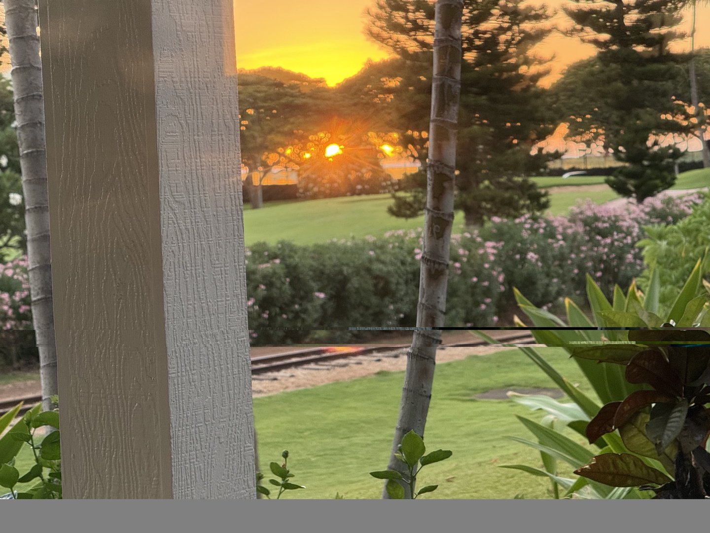Kapolei Vacation Rentals, Coconut Plantation 1080-4 - Take the railing at golden hour and watch the sun drop behind scenery.