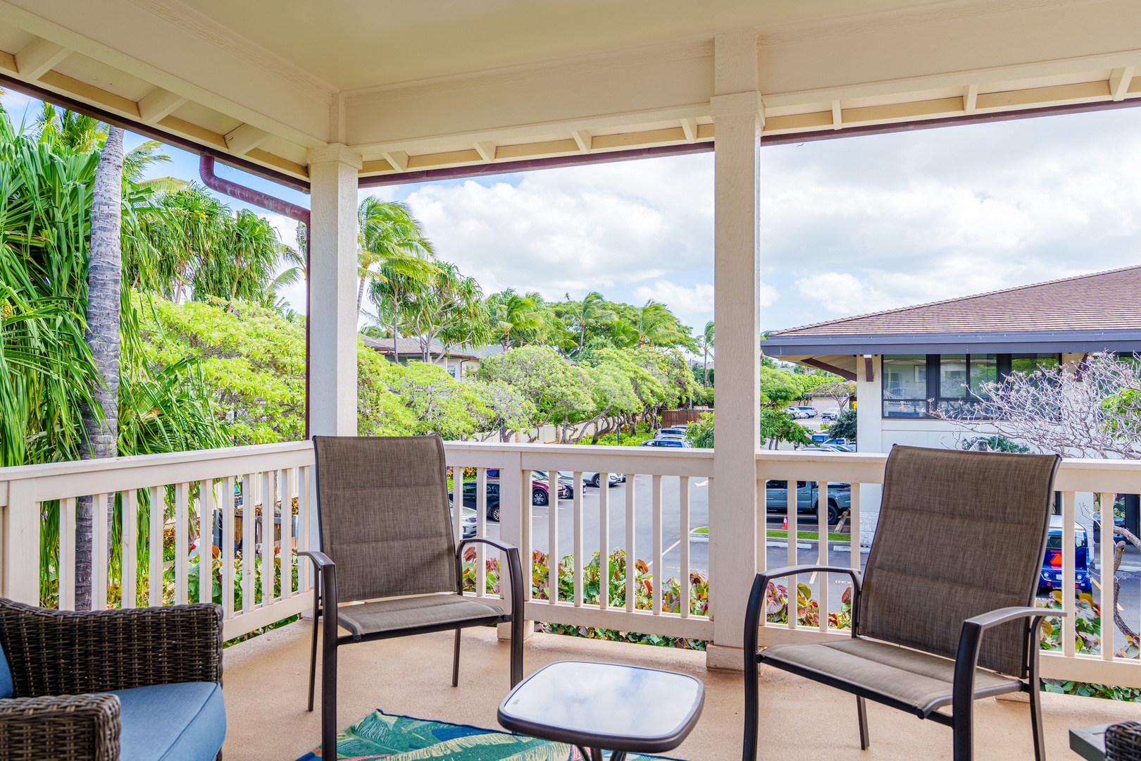 Kapolei Vacation Rentals, Coconut Plantation 1078-1 - Enjoy the fresh air and your favorite drink on the primary bedroom's lanai.