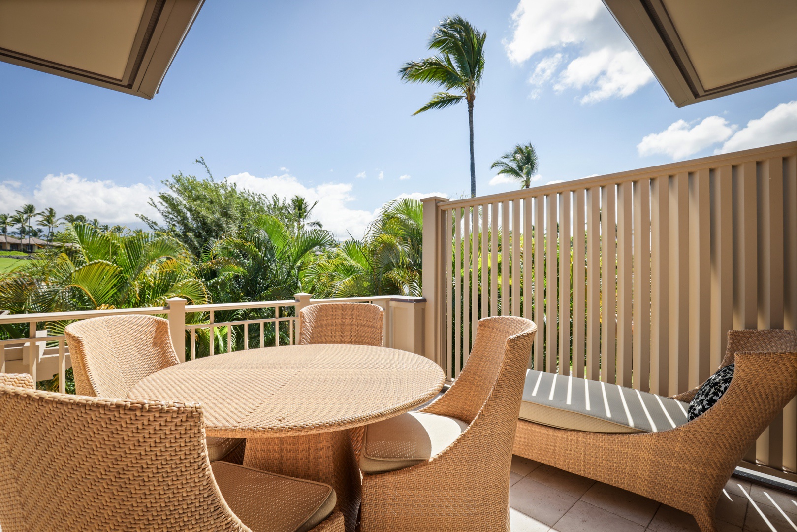 Kailua Kona Vacation Rentals, 3BD Ke Alaula Villa (210B) at Four Seasons Resort at Hualalai - Breakfast table and lounge chair on bonus balcony off the kitchen.