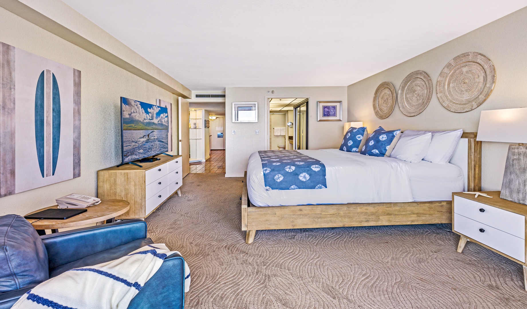 Lahaina Vacation Rentals, Kaanapali Shores 502 - This airy bedroom features plush bedding and soft coastal accents, with ample space to relax and unwind.