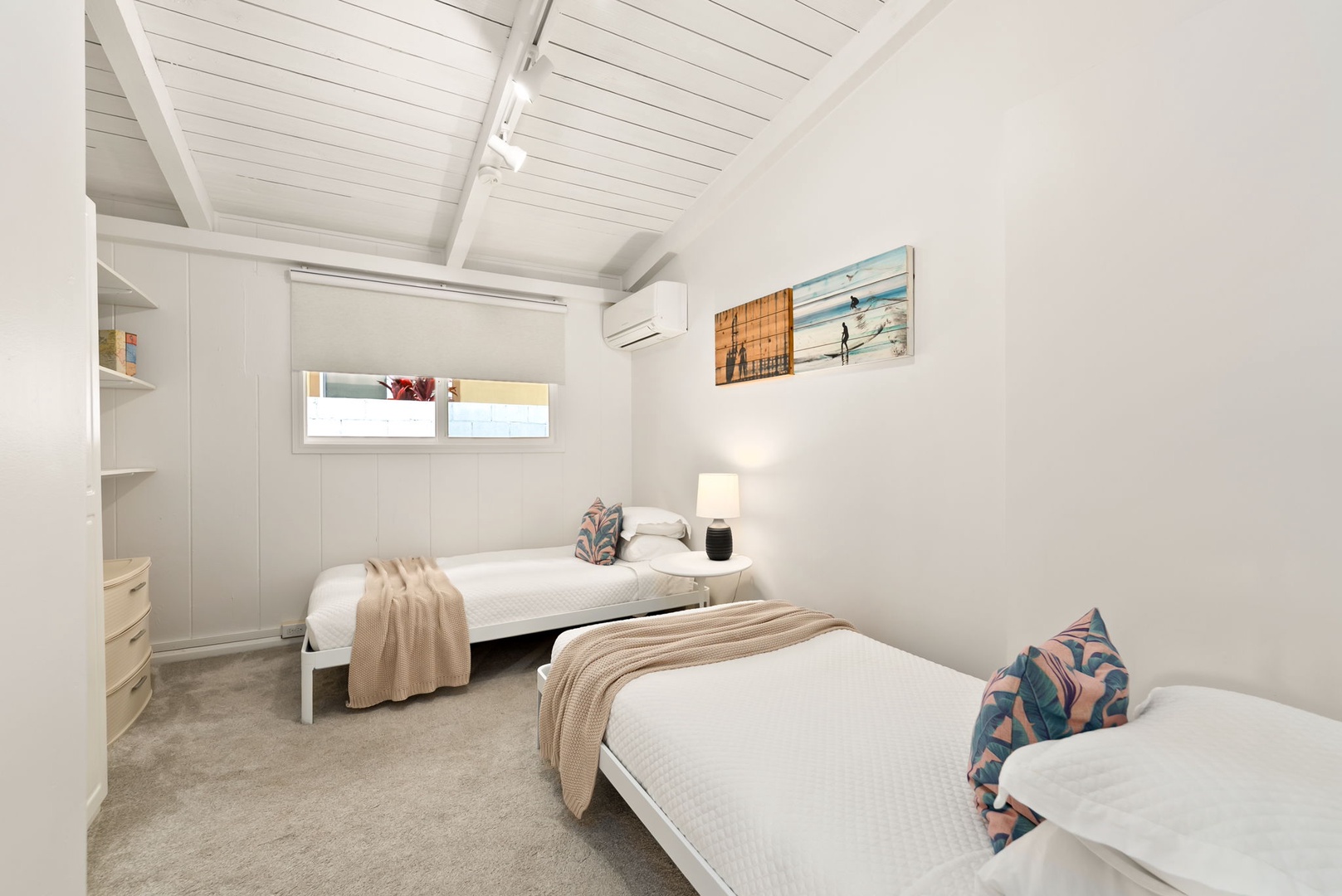 Honolulu Vacation Rentals, Ho'okipa Villa - Drift into a restful night in your bright coastal bedroom with twin beds, thoughtful storage, and a soothing seaside vibe that welcomes you home.