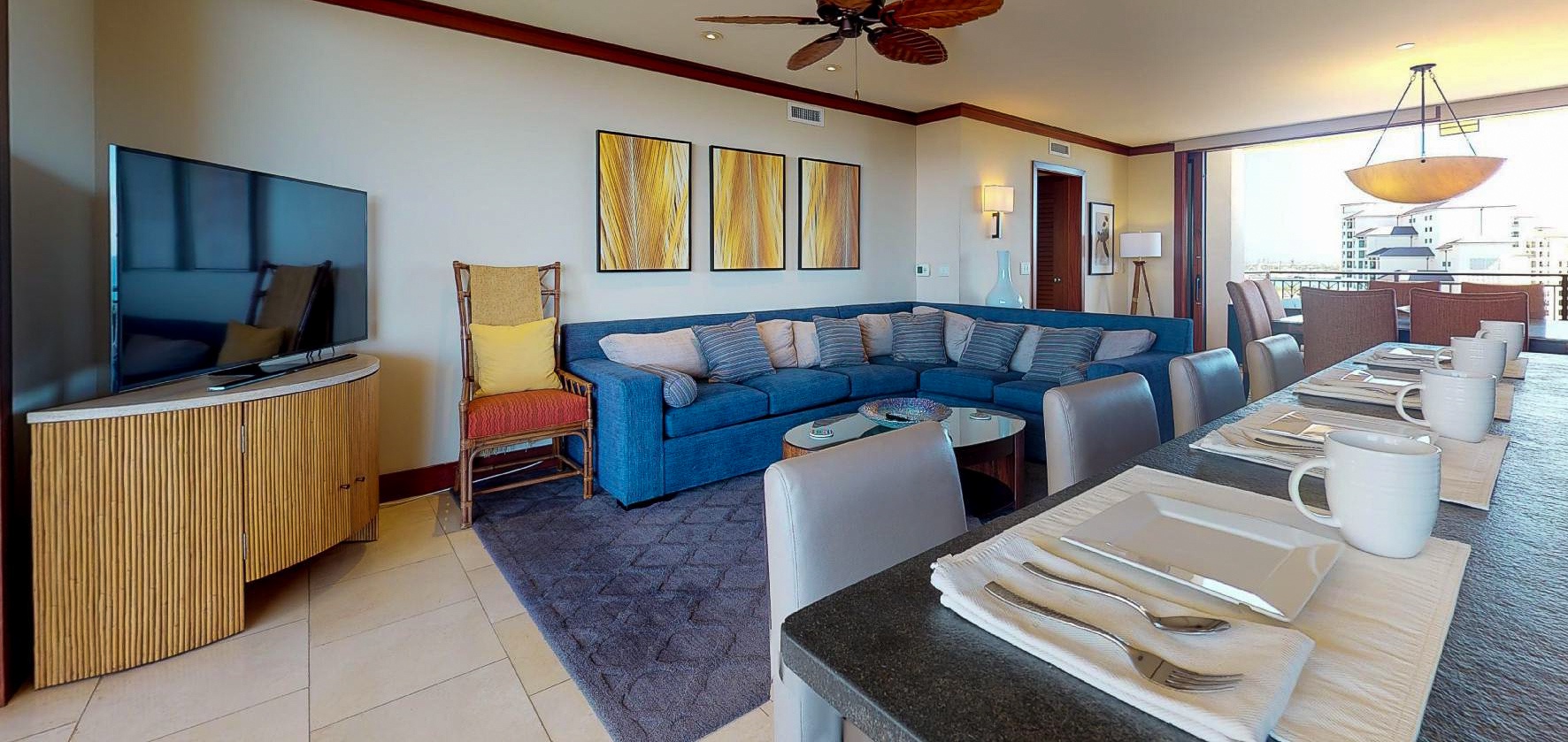 Kapolei Vacation Rentals, Ko Olina Beach Villas O1121 - The living area with TV and sectional.
