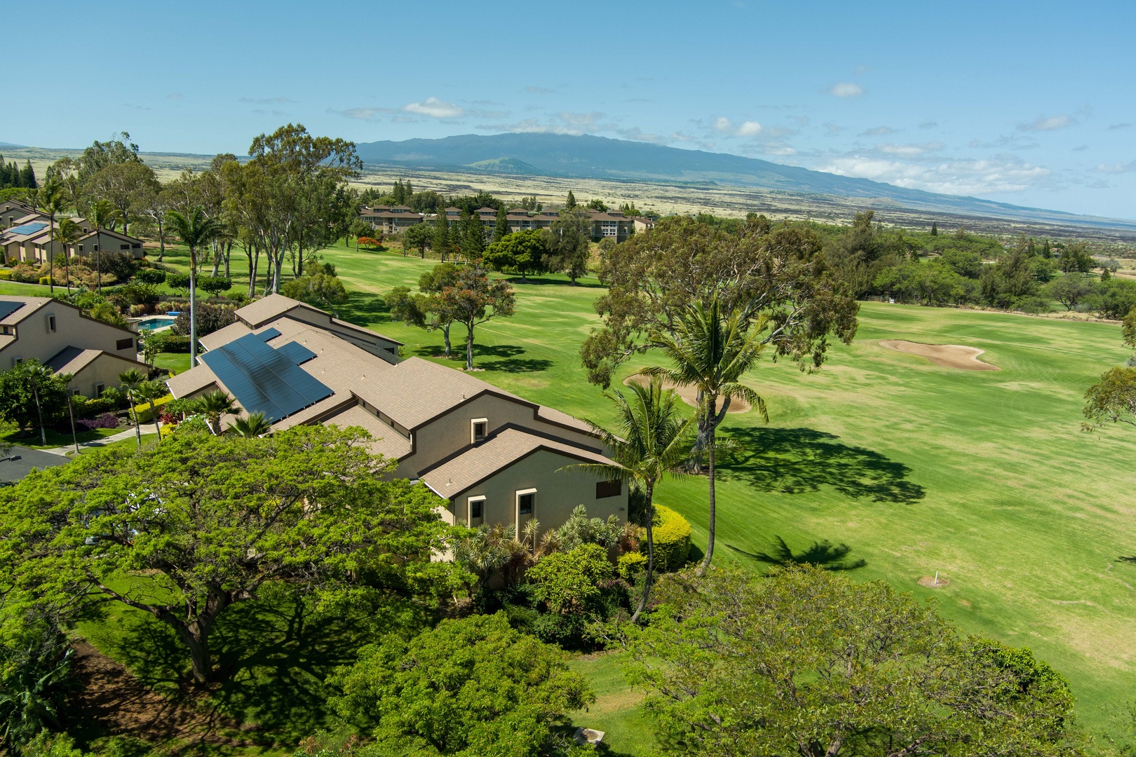 Waikoloa Vacation Rentals, Waikoloa Villas A107 - Aerial perspective of Building A reveals its prime corner location and lush surroundings along the golf course fairway.