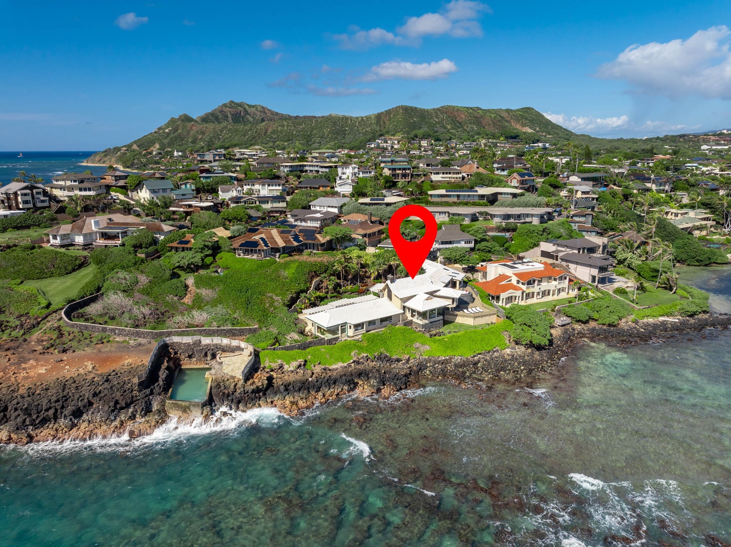 Honolulu Vacation Rentals, Black Point Ocean Villa - Stunning oceanfront location nestled between pristine turquoise waters and lush tropical mountains in an exclusive residential neighborhood.