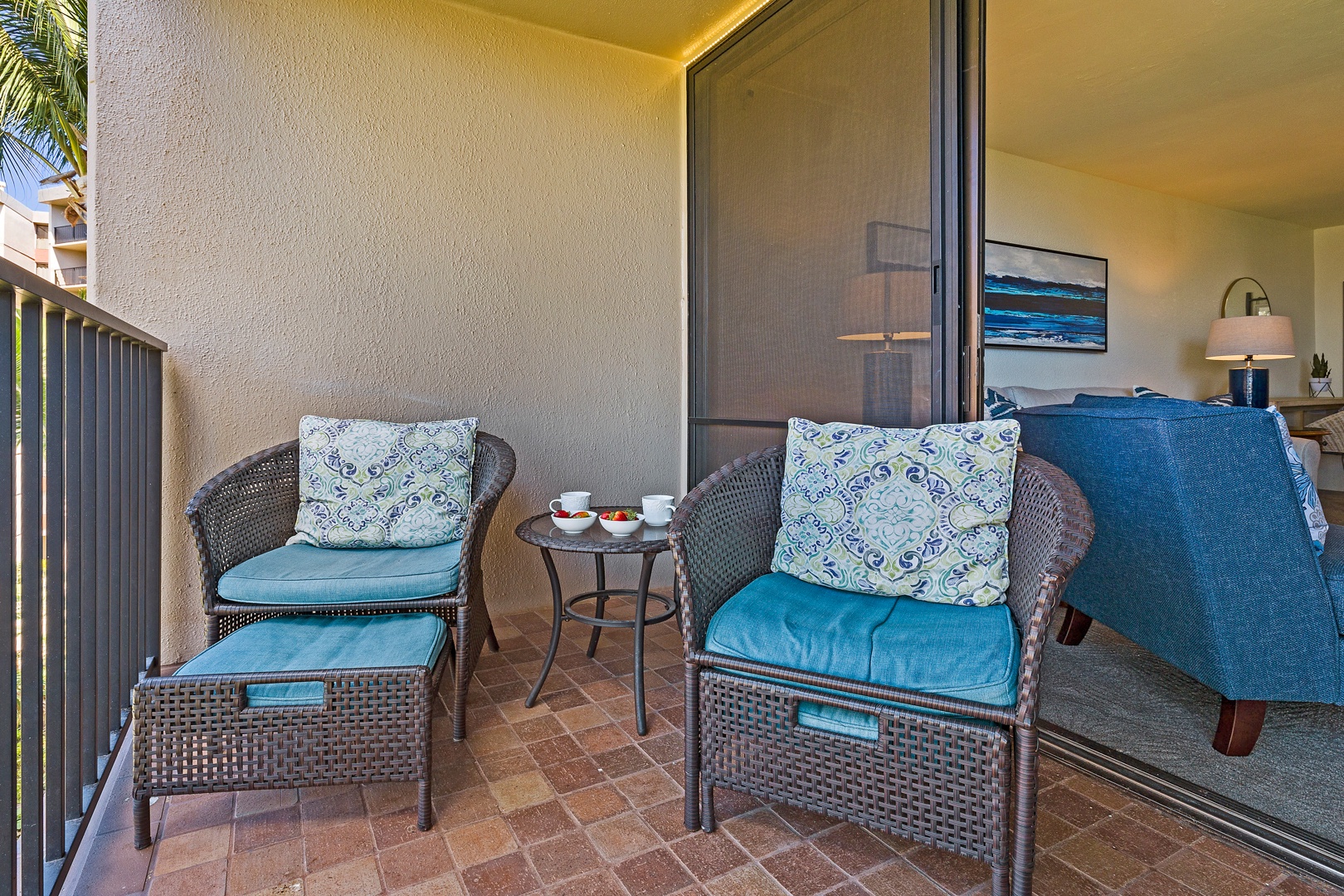 Lahaina Vacation Rentals, Kaanapali Shores 544 - Unwind in the cozy outdoor seating area, perfect for a quiet moment with a good book or enjoying a refreshing drink in the tropical breeze.