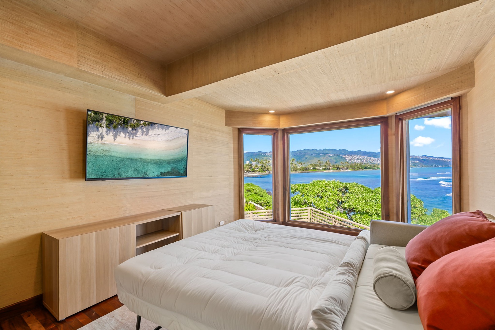 Honolulu Vacation Rentals, Black Point Ocean Villa - Wake up to breathtaking ocean views from your plush bed, where tropical waters and mountains create your daily sunrise backdrop.