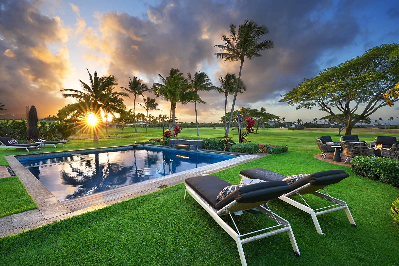 Koloa Vacation Rentals, Hale Pakika at Kukui'ula - Immerse yourself in luxury with this pool and spa combo, featuring lounging areas and tropical landscaping.