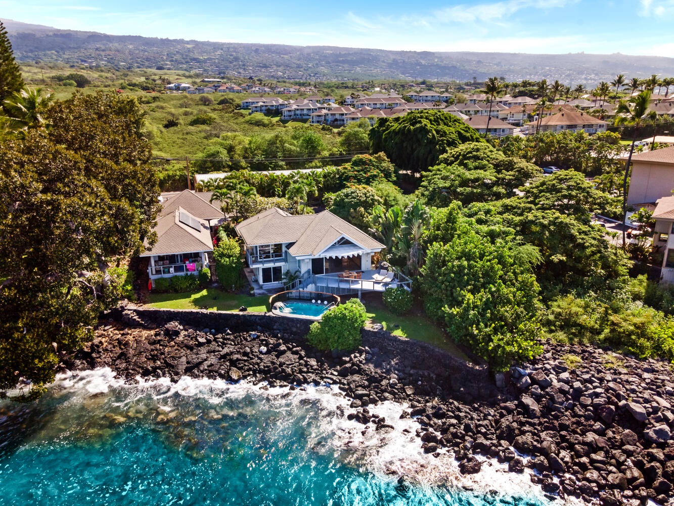 Kailua-Kona Vacation Rentals, Hale Kope Kai - Aerial view of your private oceanfront escape—tucked into Kona’s lush, coastal lava cliffs.