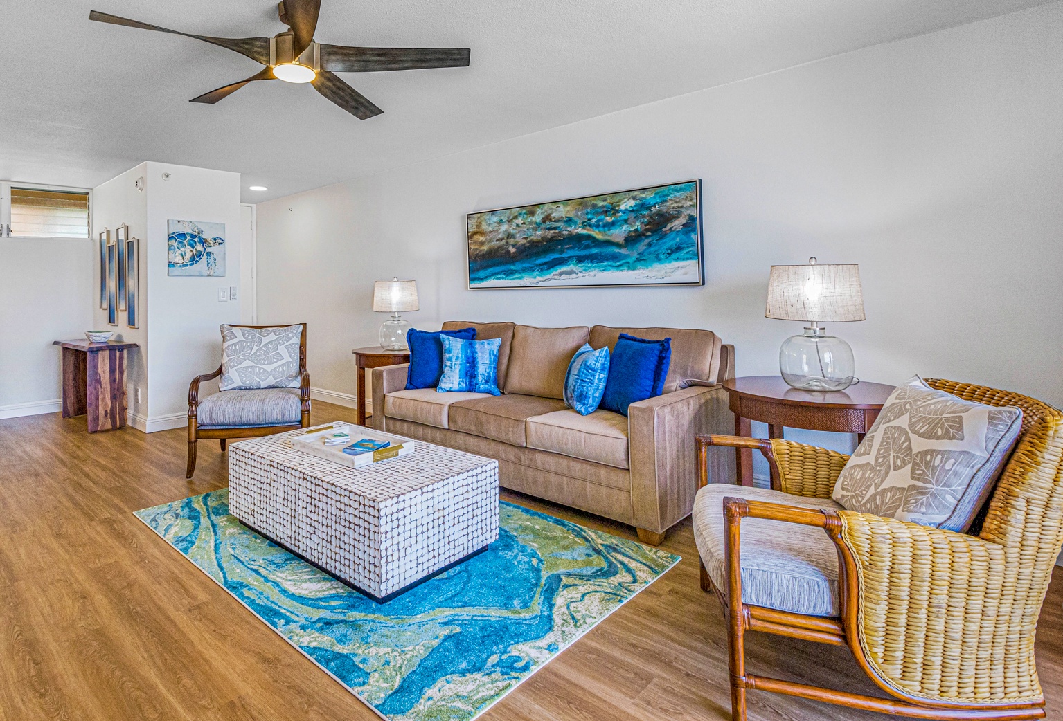 Lahaina Vacation Rentals, Royal Kahana 213 - The living room offers cozy seating with vibrant accents, perfect for unwinding after a day of island adventures.