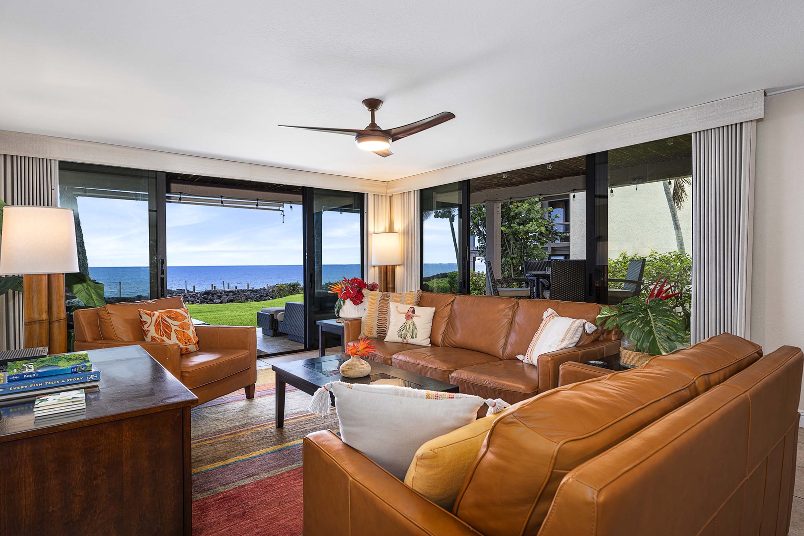 Kailua Kona Vacation Rentals, Keauhou Kona Surf & Racquet 2101 - Be greeted with an open living area. Spacious and airy interiors framed by sleek glass walls and sliders.