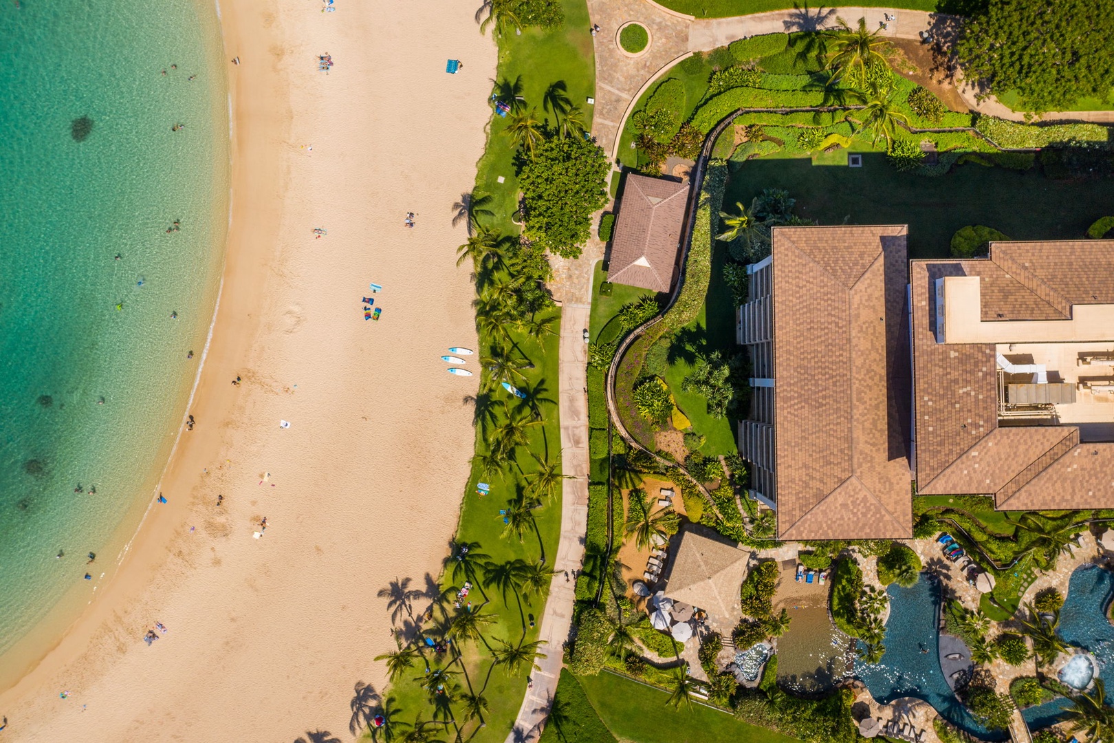 Kapolei Vacation Rentals, Ko Olina Beach Villas B604 - Stunning beachfront resort with pristine sandy shores, tropical gardens, and crystal-clear turquoise waters just steps from your accommodation.