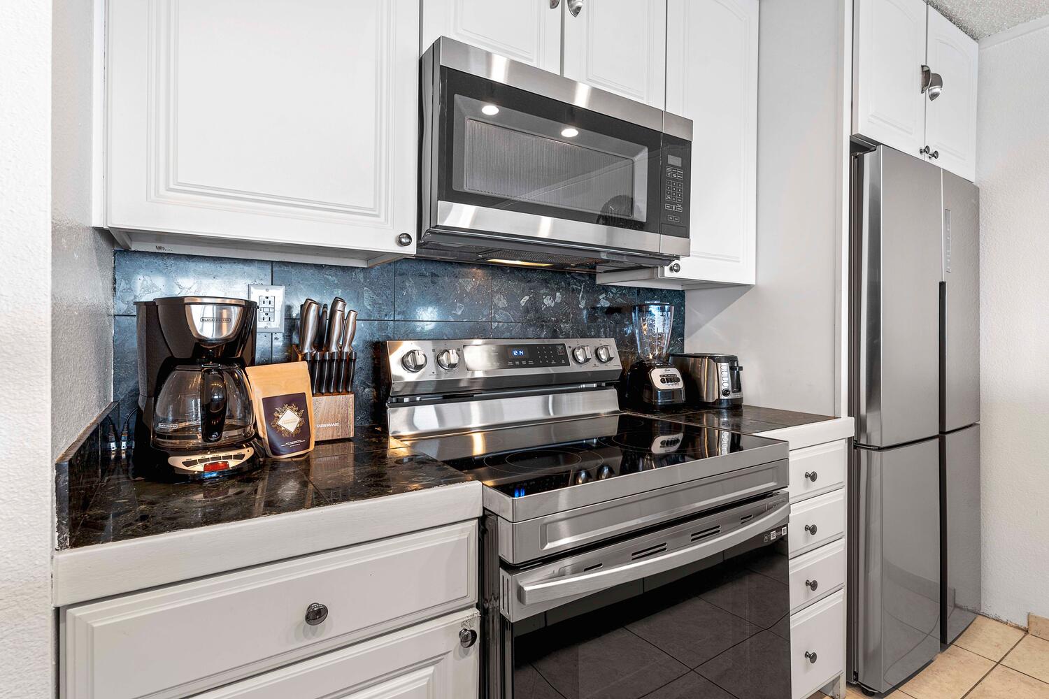 Kailua Kona Vacation Rentals, Kona Reef F23 - The fully stocked kitchen for your culinary adventures!