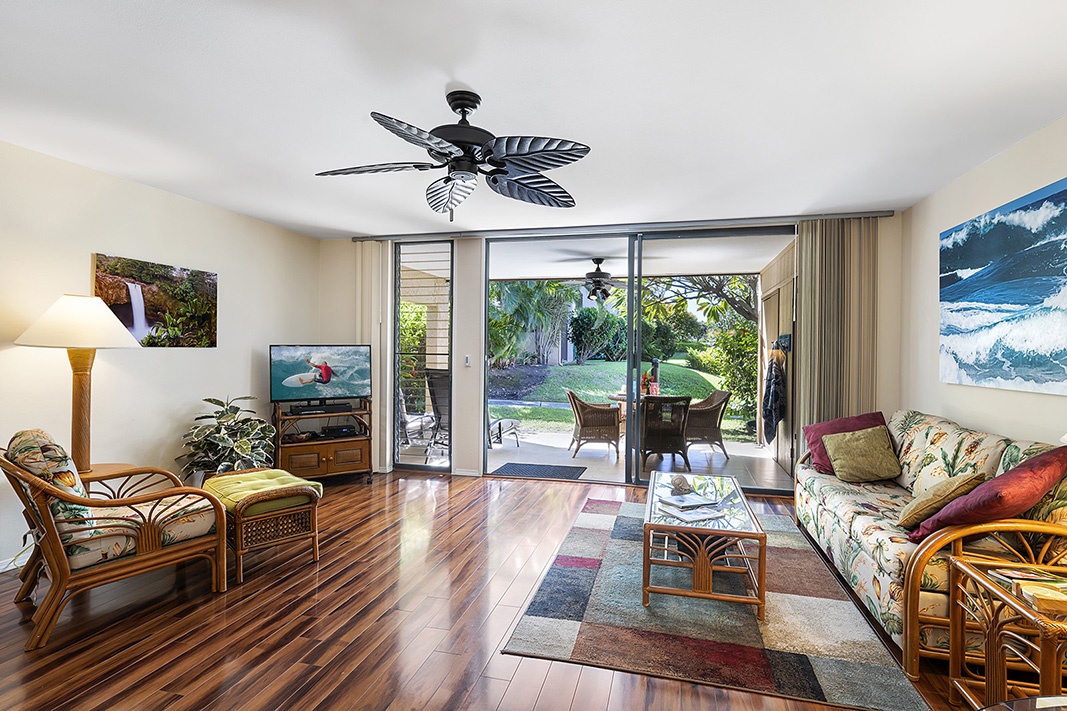 Waikoloa Vacation Rentals, Waikoloa Villas F-100 - Large sliding glass doors lead to your lanai, blending indoor comfort with Hawaii’s serene outdoor lifestyle.