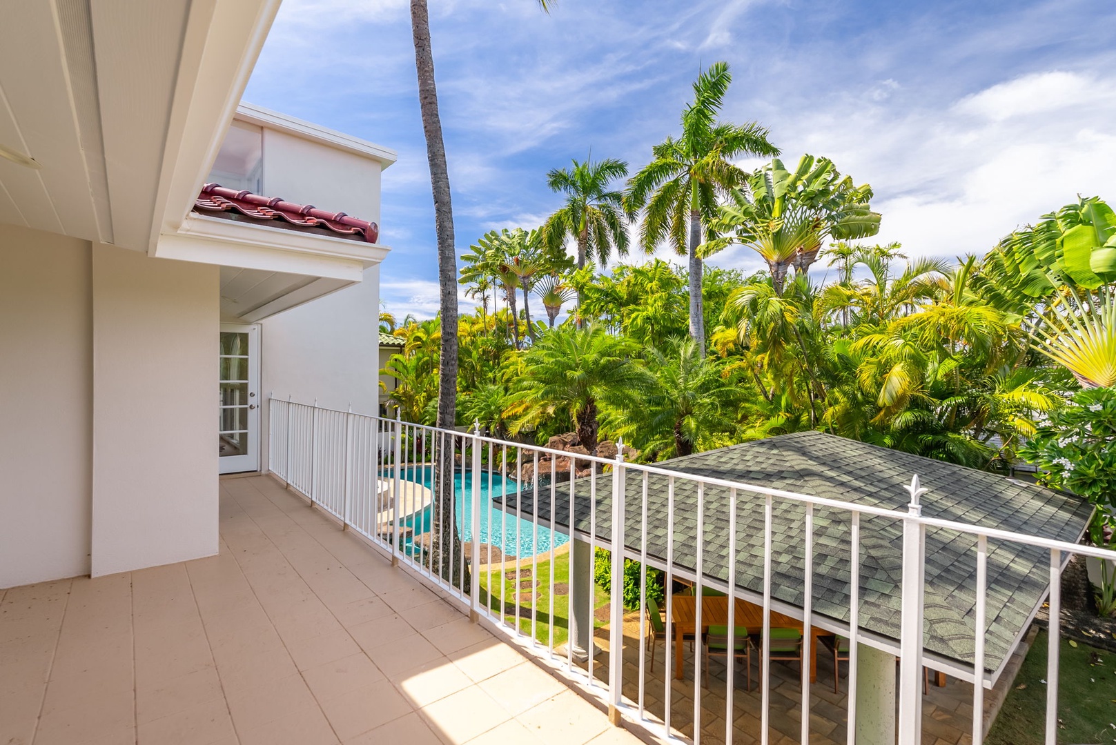 Honolulu Vacation Rentals, Kahala Oasis - Private lanai with scenic views of the tropical landscape, ideal for enjoying the tranquil surroundings.