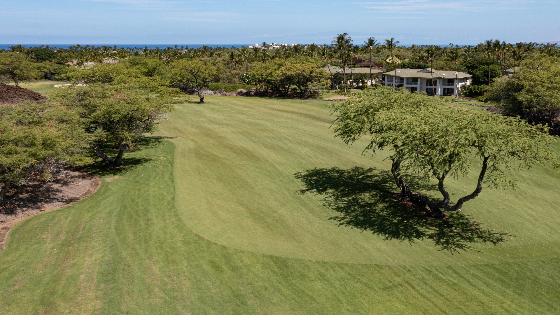 Kamuela Vacation Rentals, Beach Walker at Champion Ridge - Panoramic view of the Mauna Lani North Golf Course from Beach Walker, where rolling fairways and ocean breezes create a stunning island backdrop.