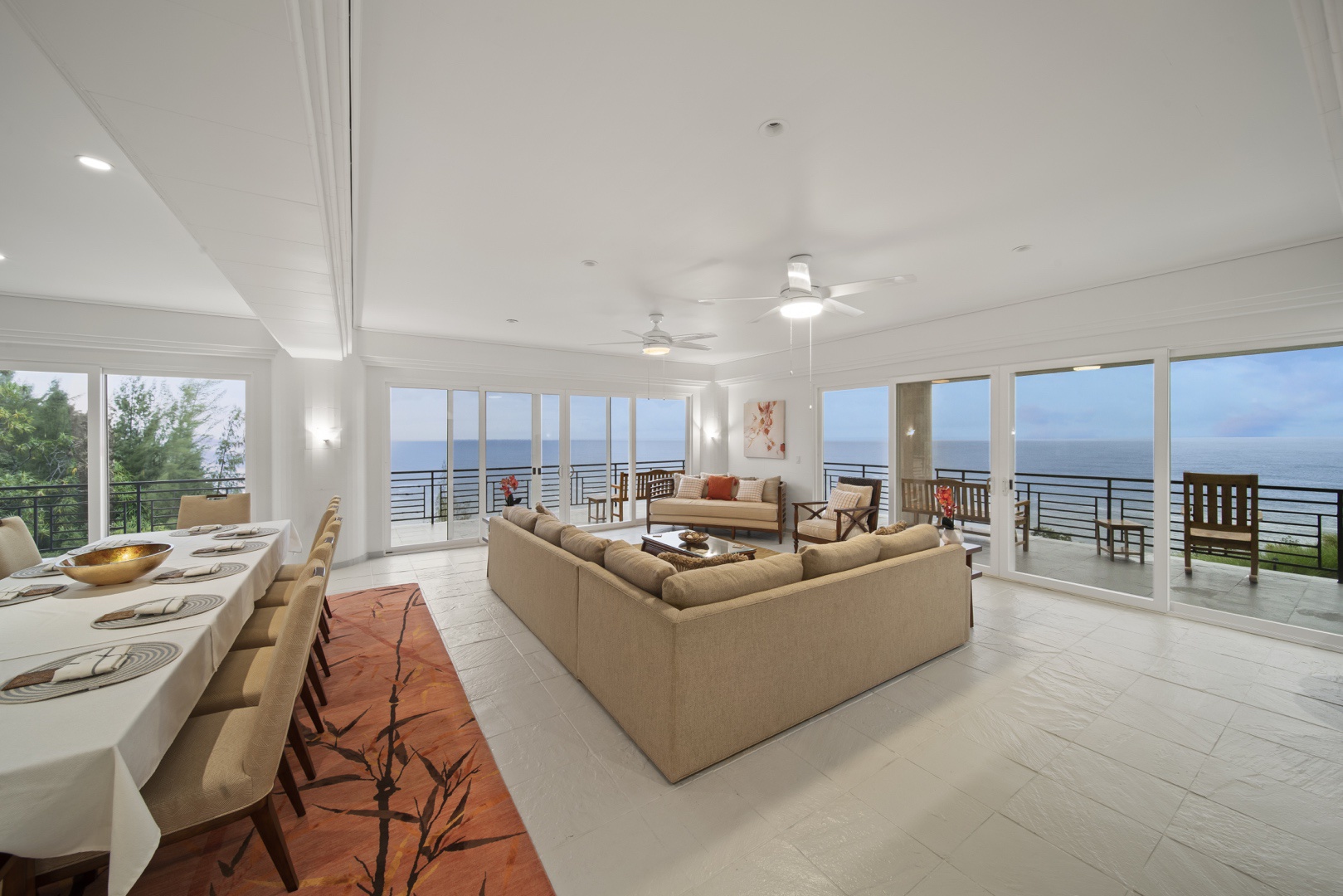 Ninole Vacation Rentals, Waterfalling Estate - Wider view of great room and deck seating.