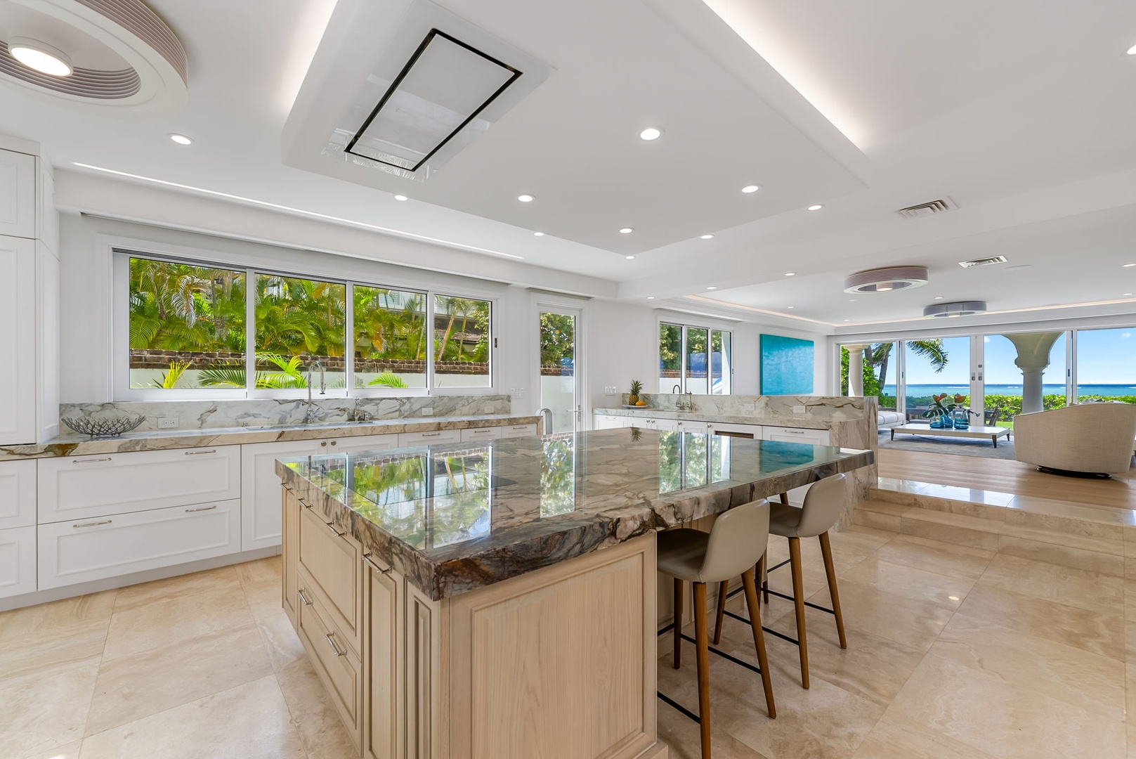 Kailua Vacation Rentals, Lanikai Sunrise Estate - Spacious culinary hub featuring two islands and dual sinks—tailored for group cooking and casual dining.