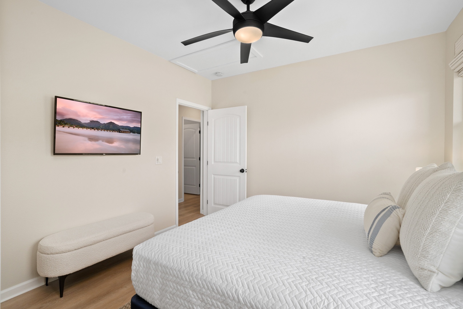 Princeville Vacation Rentals, Hale Kaua'i - Settle into comfort with plush bedding, calming tones, and a quiet space to unwind.