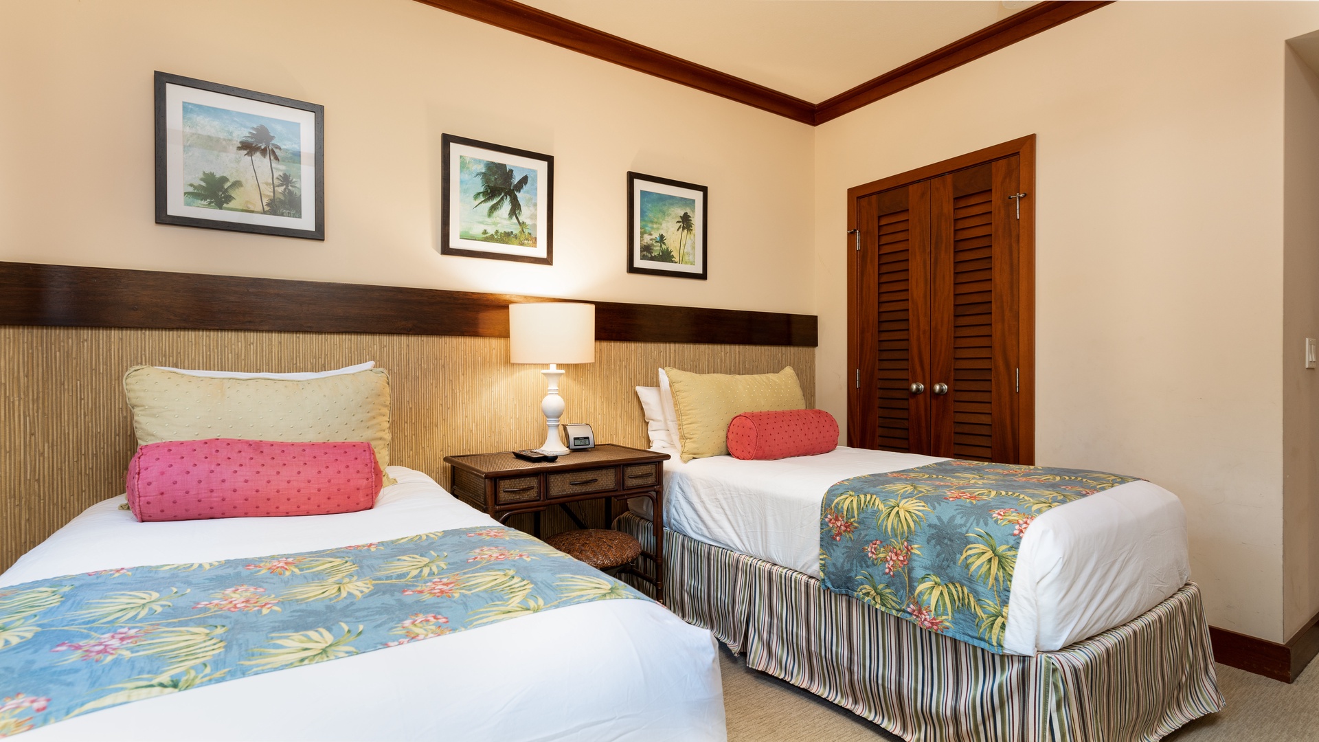 Kapolei Vacation Rentals, Ko Olina Beach Villas B202 - The second guest bedroom with delightful prints and cozy accommodations.