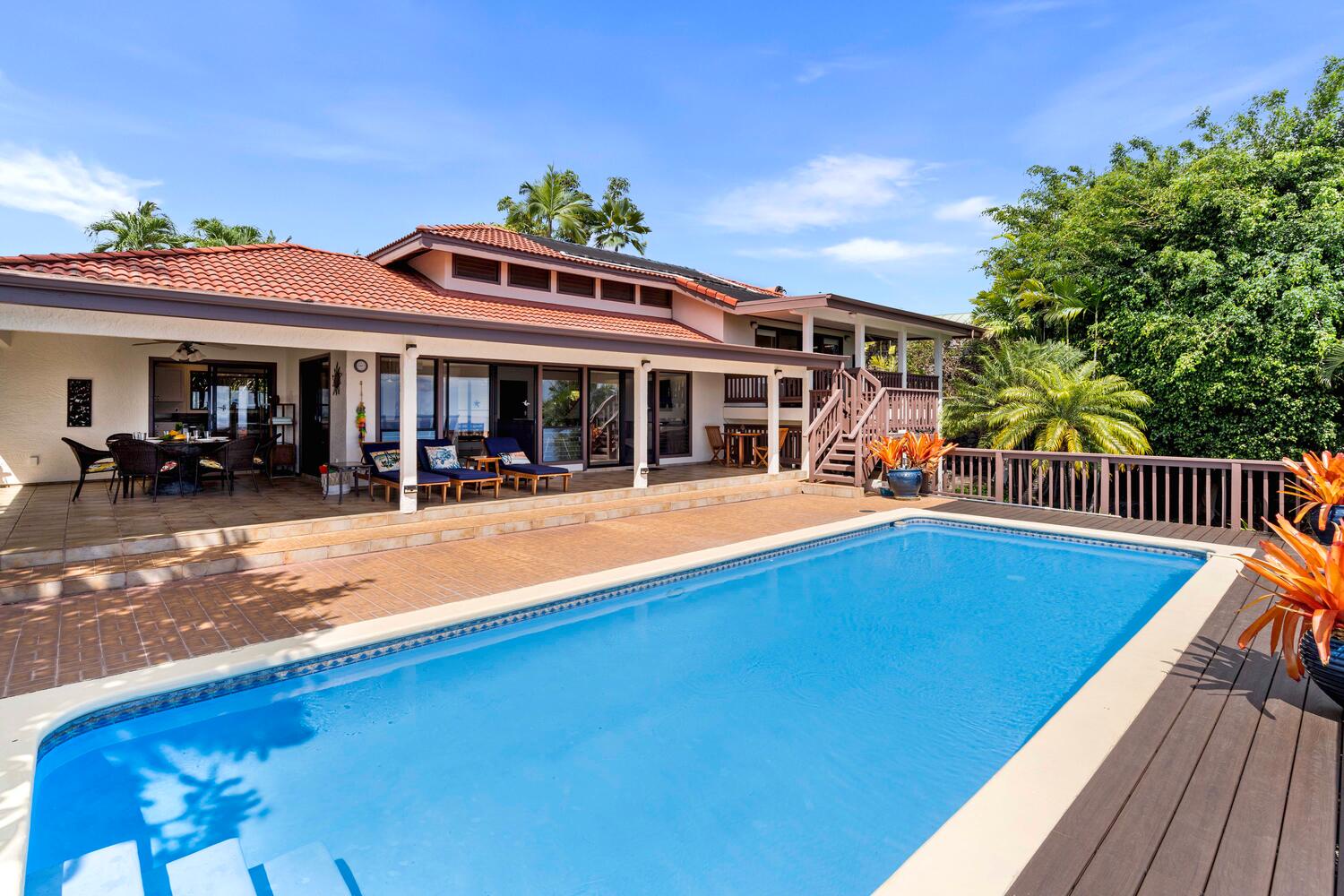 Kailua Kona Vacation Rentals, Kona Dreams - Relax by the pool and soak up the sun on the spacious lanai with sun loungers.