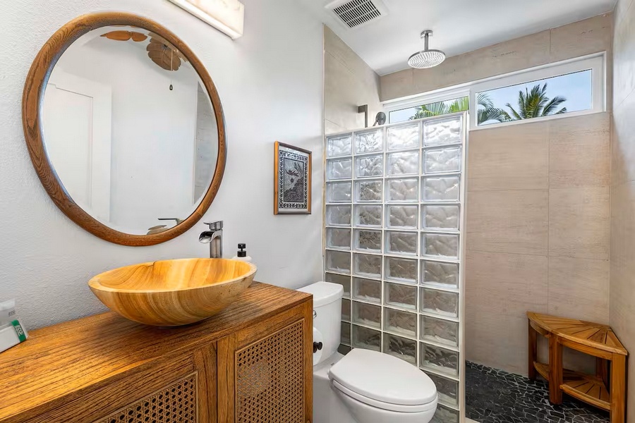 Kailua Kona Vacation Rentals, Manukai Hale - A carved wood vessel sink turns this bath into something a little unexpected.