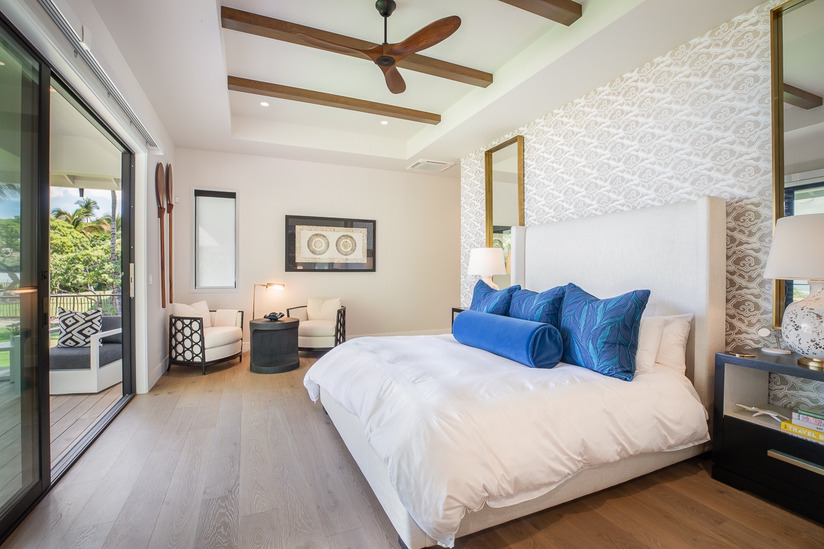 Kamuela Vacation Rentals, Puako Beach Getaway - Drift into a peaceful slumber in the primary suite, featuring a plush king bed enveloped in soft pillows and fine linens.