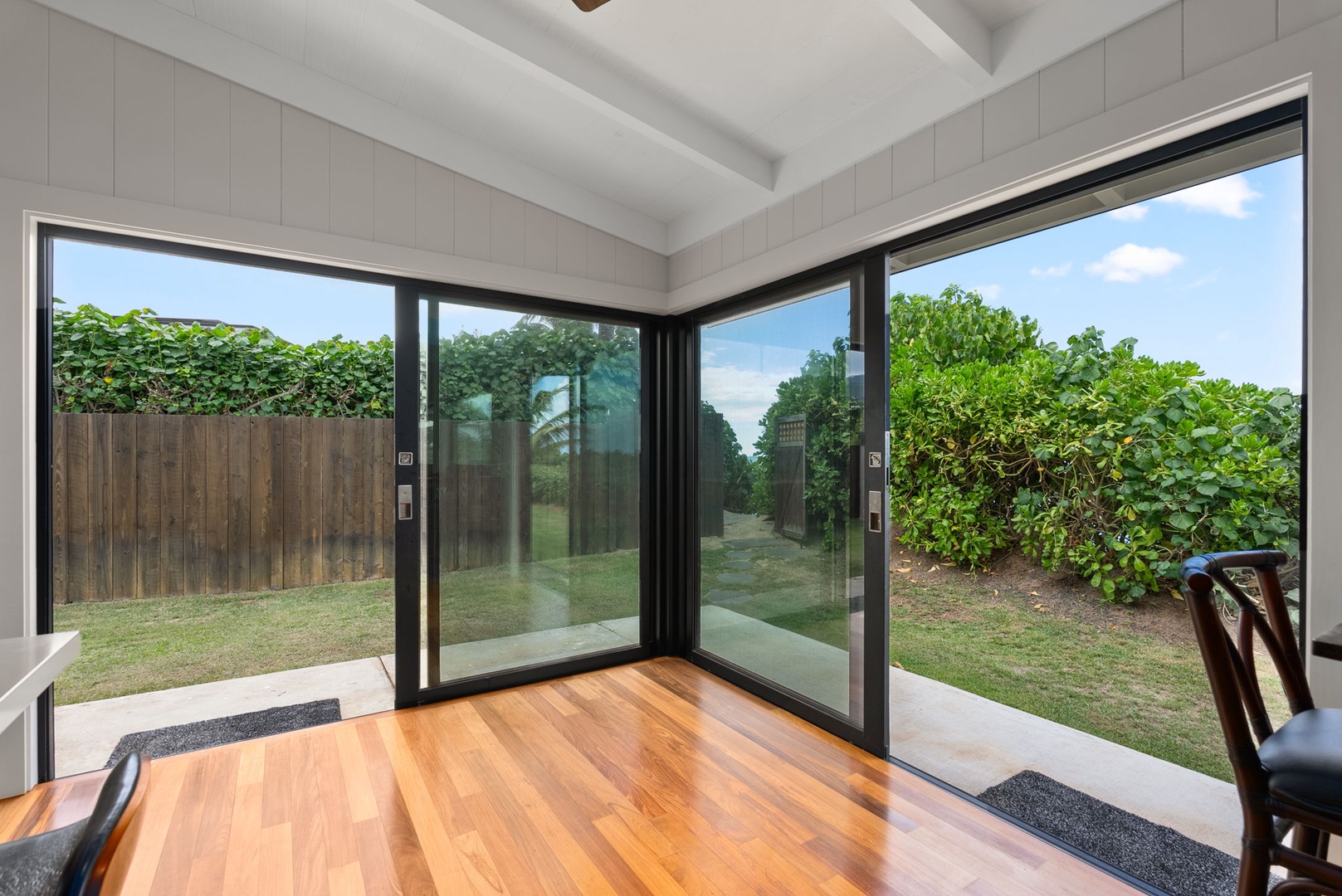 Waialua Vacation Rentals, Mokuleia Beach Villa** - The Fleetwood sliding glass doors allow you to fully open the living area to the outdoors