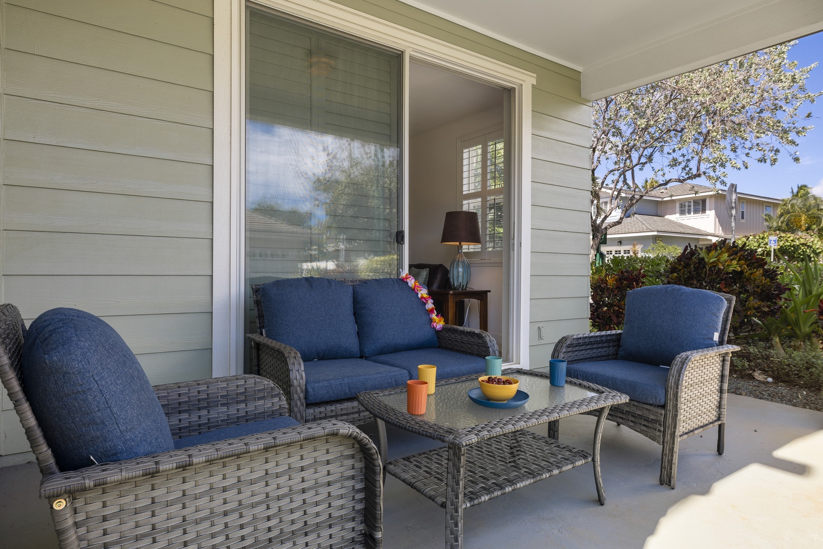 Enjoy morning coffee or evening relaxation on the private covered lanai surrounded by lush tropical greenery.