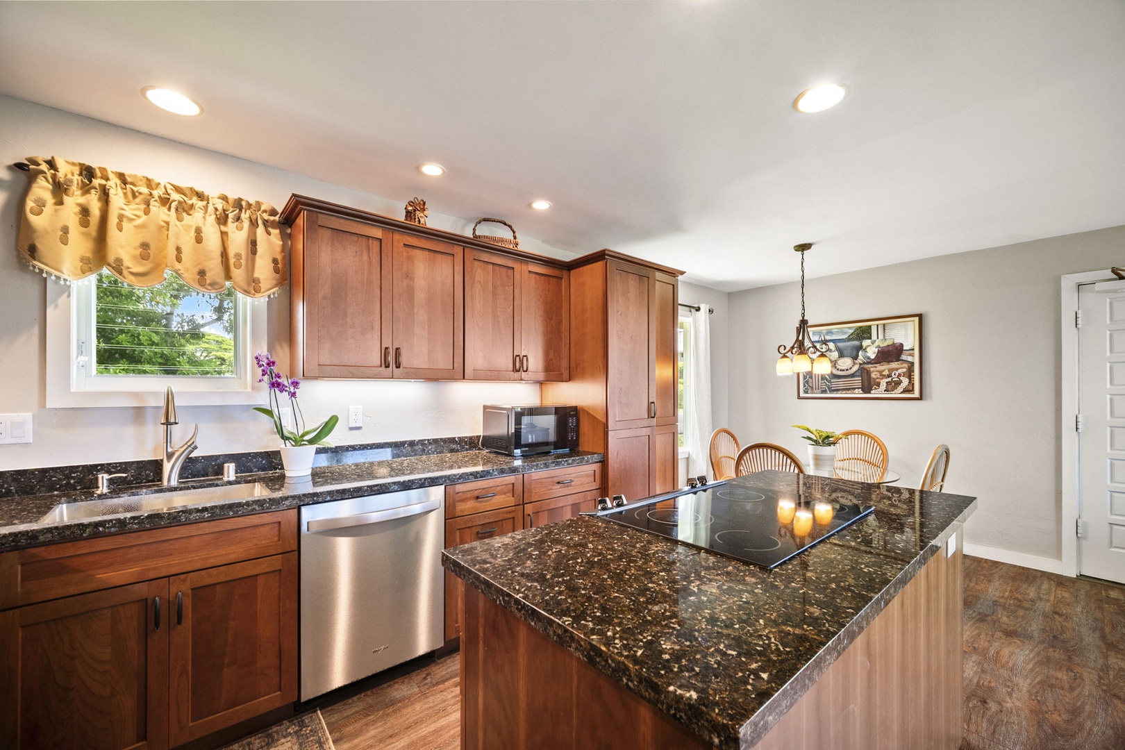 Princeville Vacation Rentals, Alii Kai 7201 - Chop and prep at the island with the window keeping you company.