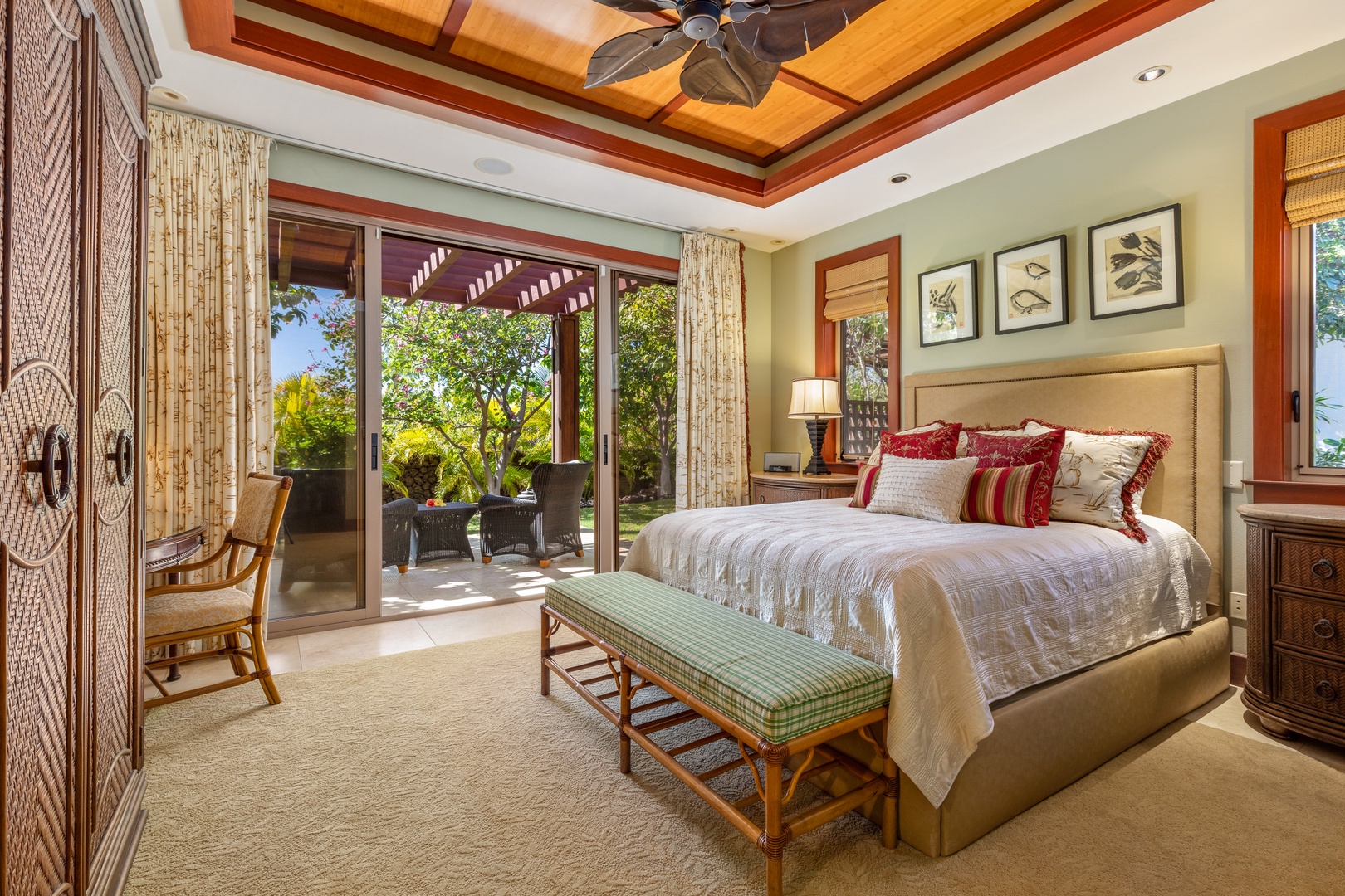 Kamuela Vacation Rentals, Champion Ridge Home - Unwind in this stylish guest suite offering king-size comfort, ceiling fan, and garden scenery.