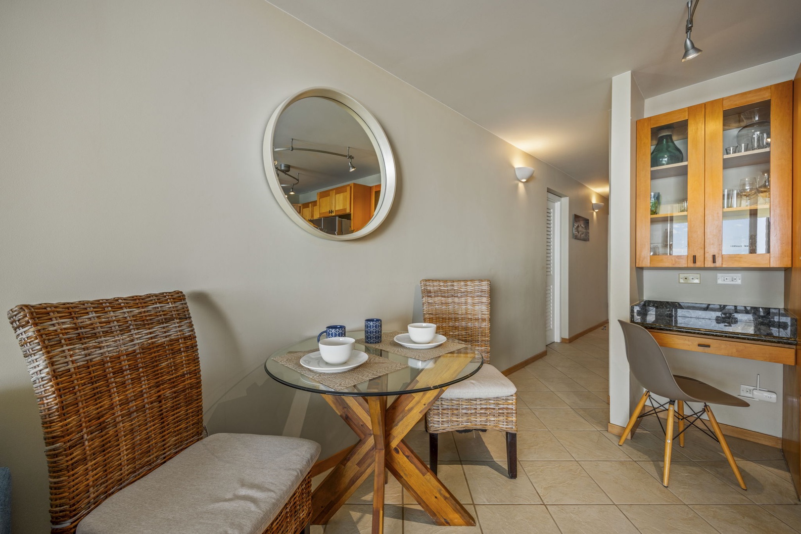 Wailuku Vacation Rentals, Milowai 310 - A small round table by the kitchen makes morning coffee feel like its own quiet moment.