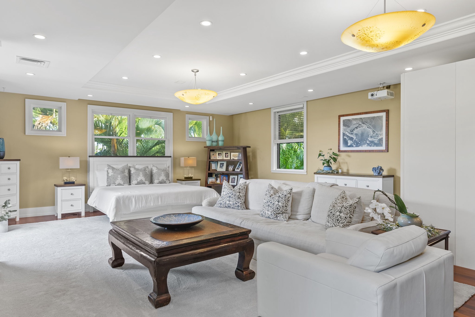 Honolulu Vacation Rentals, Pili Pono - Elegant living area showcasing a seamless indoor-outdoor flow.