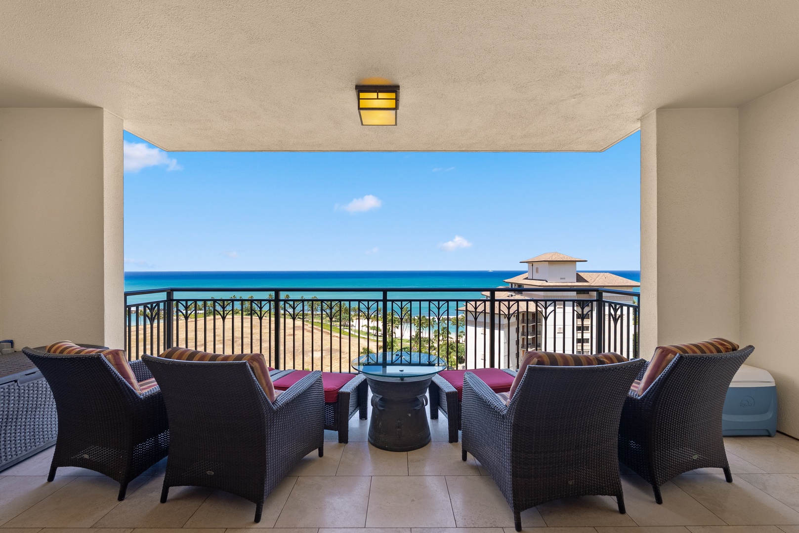 Kapolei Vacation Rentals, Ko Olina Beach Villas O1404 - Morning coffee on the lanai with the ocean filling the view from this height.