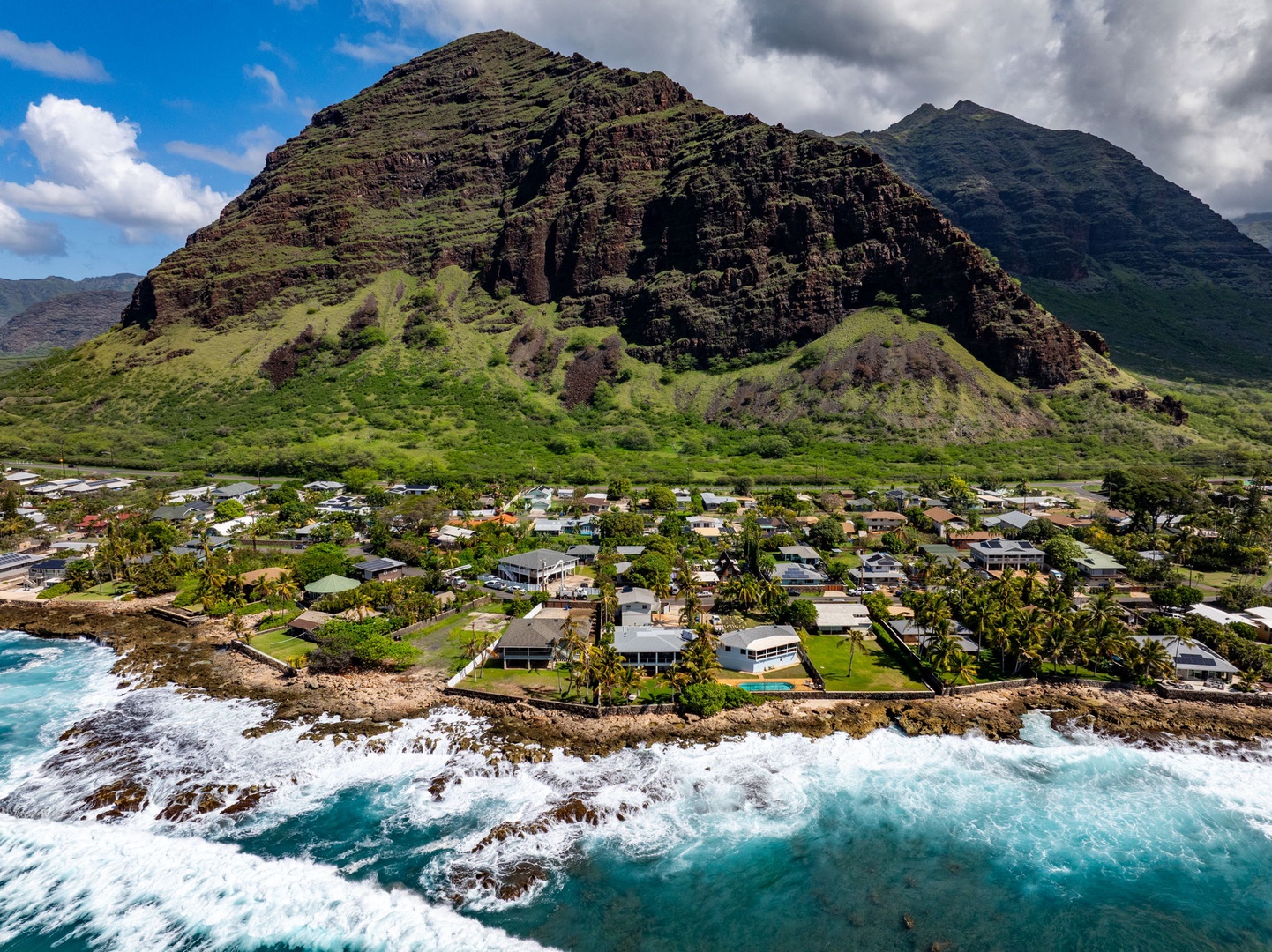 Waianae Vacation Rentals, Oceanfront Luxury Dream Estate - A coastal village vibe with lush mountains, turquoise water, and the home at the center of it all.