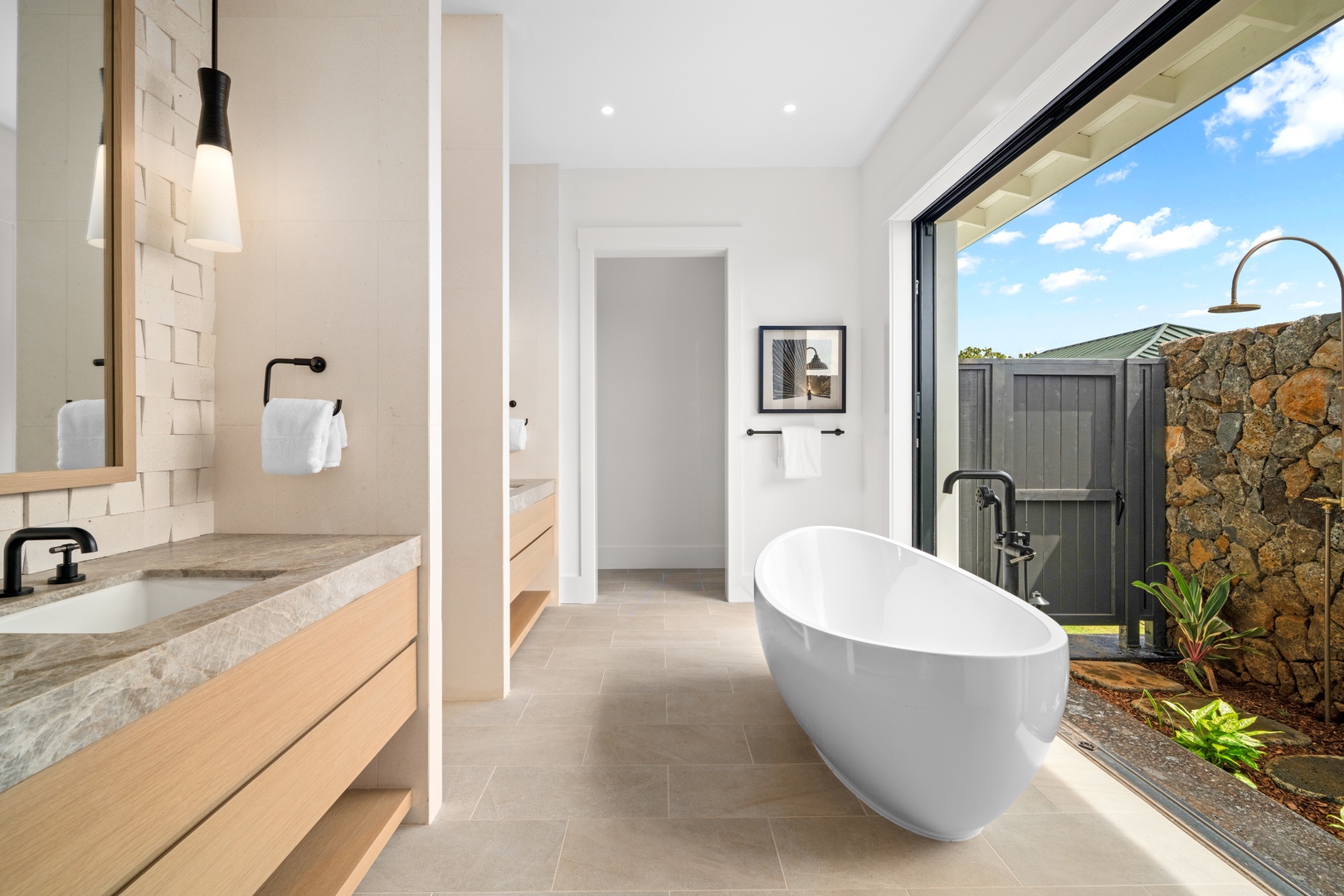 Koloa Vacation Rentals, Makani Kai - Its ensuite bath keeps an outdoor shower and soaking tub, open to a private garden wall.