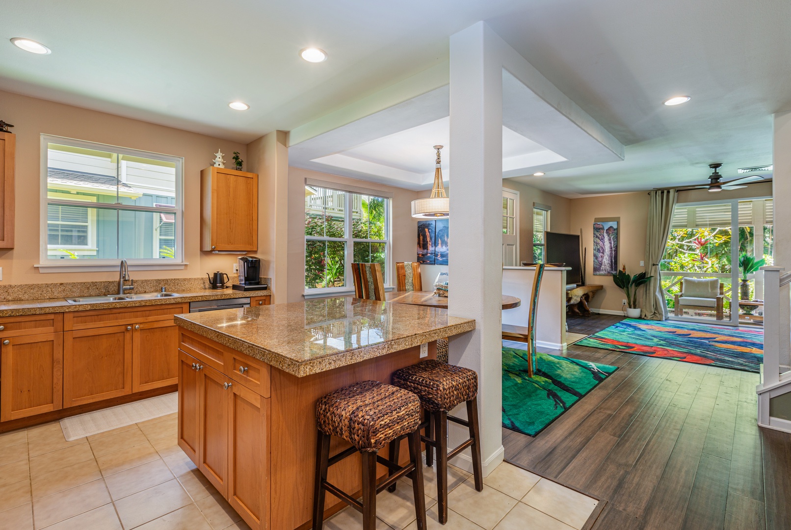 Princeville Vacation Rentals, Pualani Villa - The kitchen counter space comfortably seats four, perfect for family meals.