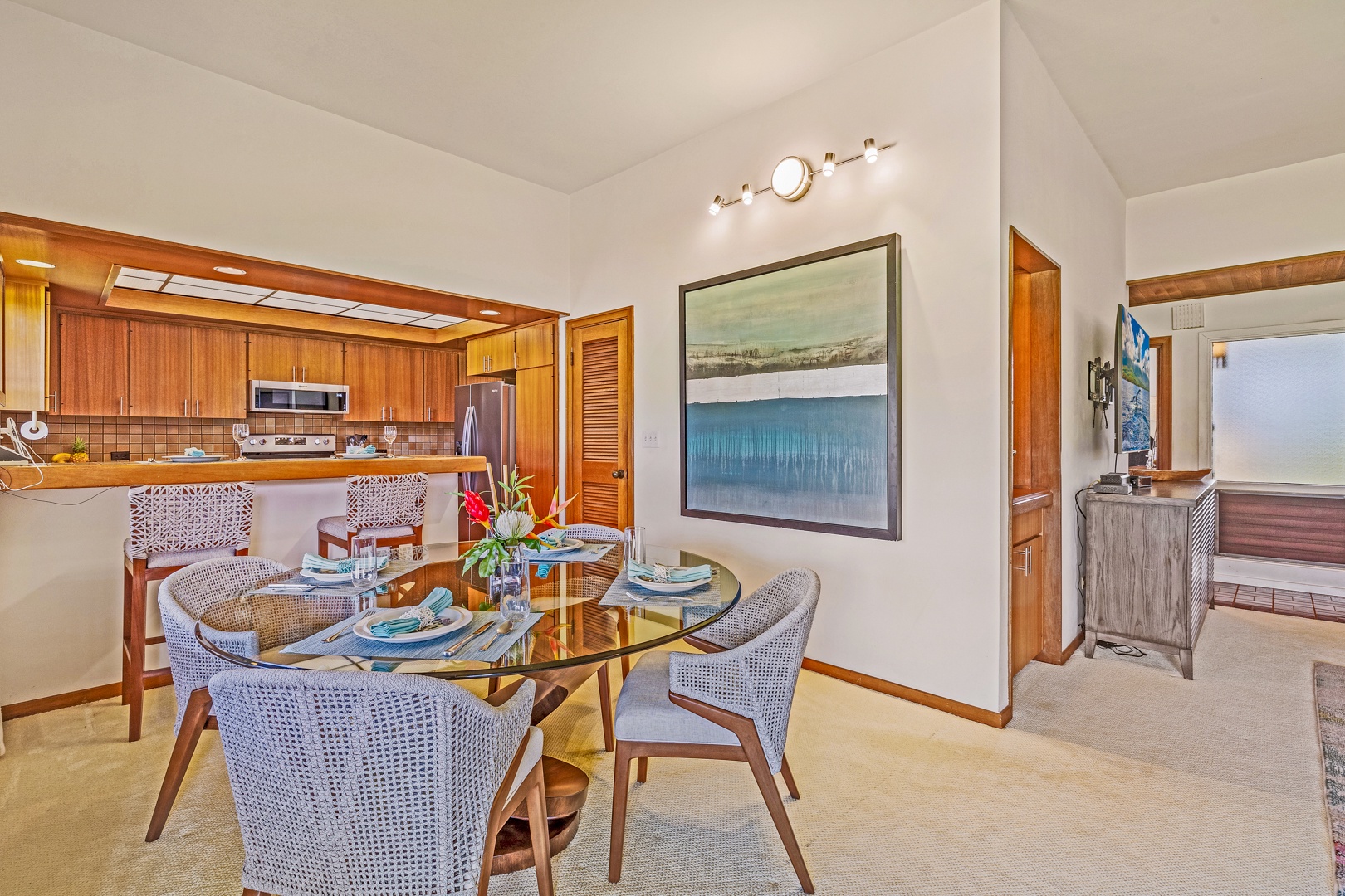 Lahaina Vacation Rentals, Kapalua Ridge 2321 - Enjoy meals together in this inviting dining area, featuring stylish seating and a contemporary design