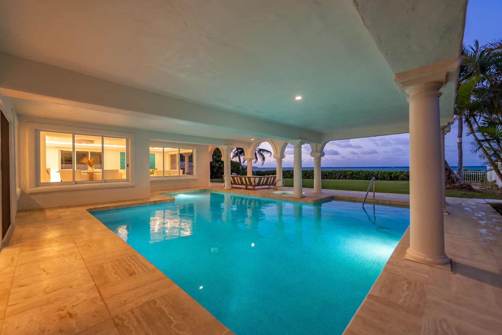 Kailua Vacation Rentals, Lanikai Sunrise Estate - Evenings are made magical in this serene covered pool, ideal for both relaxation and play.