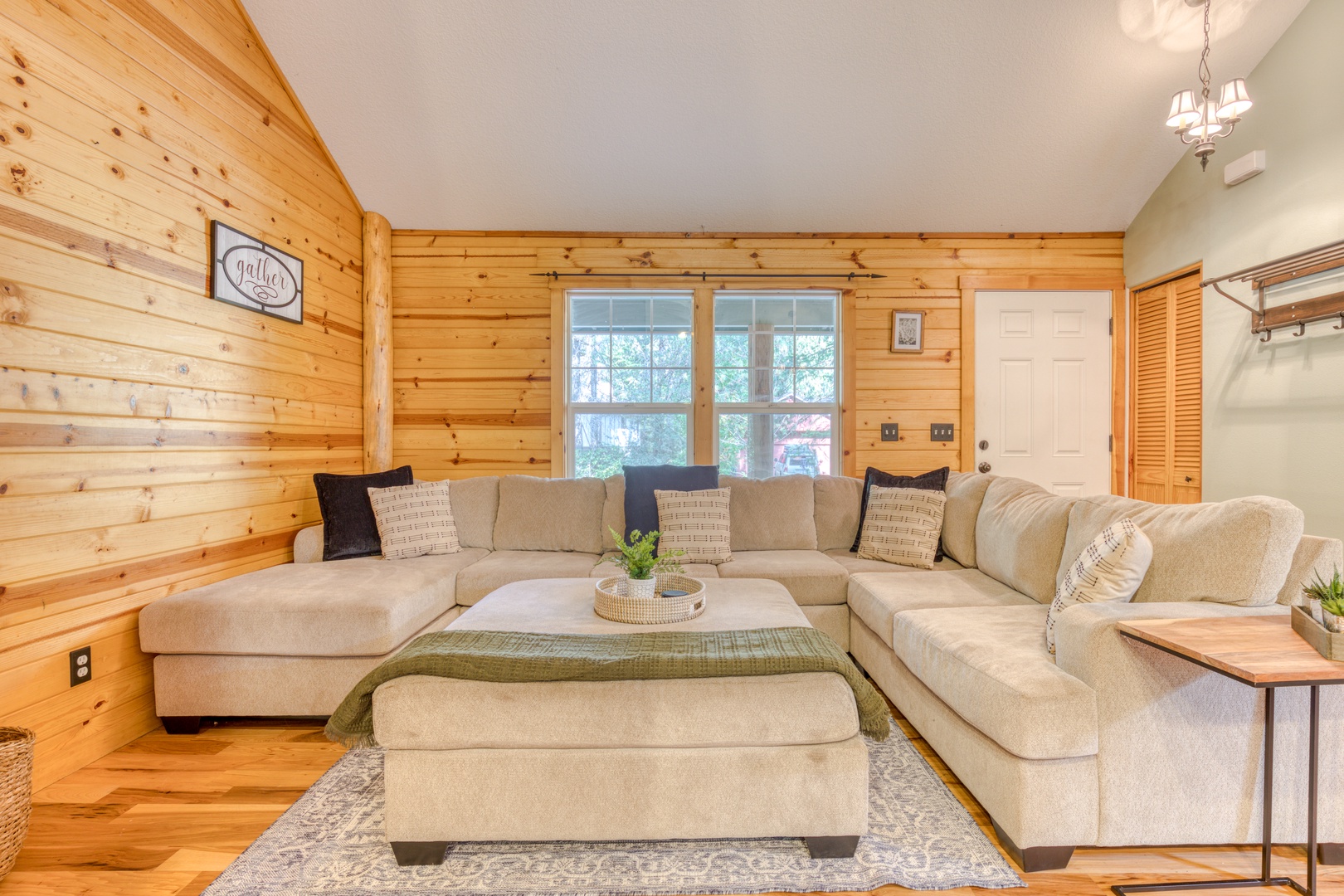 Brightwood Vacation Rentals, Riverside Retreat - This large, sectional sofa is perfect to seat the entire group together