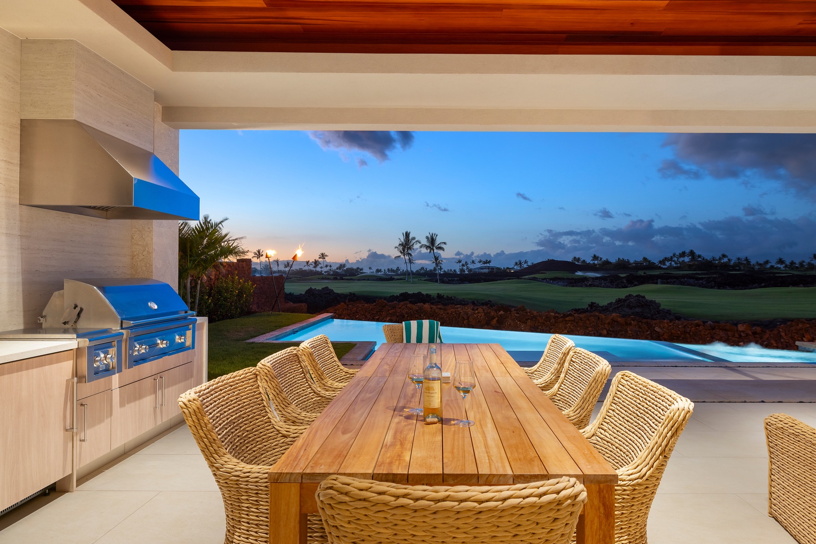 Kamuela Vacation Rentals, 6BD Mauna Lani Lux Golf Estate (5) at One Ocean - Enjoy sunset dining with tranquil views across the pool toward the horizon.